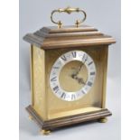 An Avia Quartz Mantel Clock, the Brass and Wooden Mounted Body of Architectural Form, 28cms High