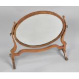 An Oval Swing Dressing Table Mirror