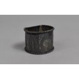An Indian White Metal Napkin Ring Decorated with Foliate Motif, 19.3g