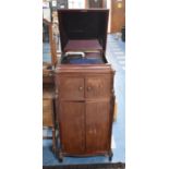 A Mahogany Free Standing Wind Up Gramophone in Need of Attention, 60cms Wide