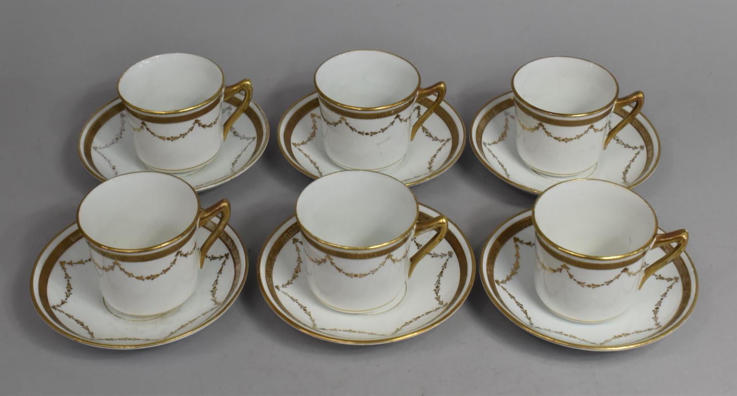 A 19th Century Porcelain Gilt and White Decorated Tea Set, Decorated with Swag and Greek Key Trim to