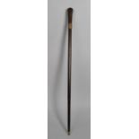 A Turned Wooden Swagger Stick with Military Rampant Lion and Kings Crown Metal Mount inscribed "Honi
