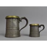 Two Graduated Victorian Brass Mounted Pewter Measures, Quart and Half Pint