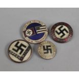 A Collection of Four Reproduction Nazi Badges