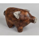 A Novelty Door Stop in the Form of a Pig, 35cm Long