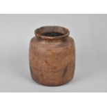 An Early Turned Wooden Jar with Ribbed Banding, 18cms High