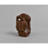 A Carved Wooden Netsuke, Robed Elder, 5.5cm high