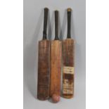 Three Vintage Cricket Bats together with a Vintage Ball