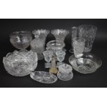 A Collection of Various Cut Glass to comprise Pedestal Bowls, Vases, Silver Mounted Glass Bottle Etc