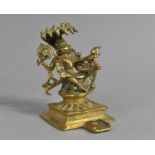 An Indian Brass Shrine Ornament in the Form of a Hindu God with Four Arms, 10.5cms High
