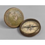 A Reproduction Circular Brass Cased Compass, the Lid Engraved with a 100 Year Calendar from 1957-