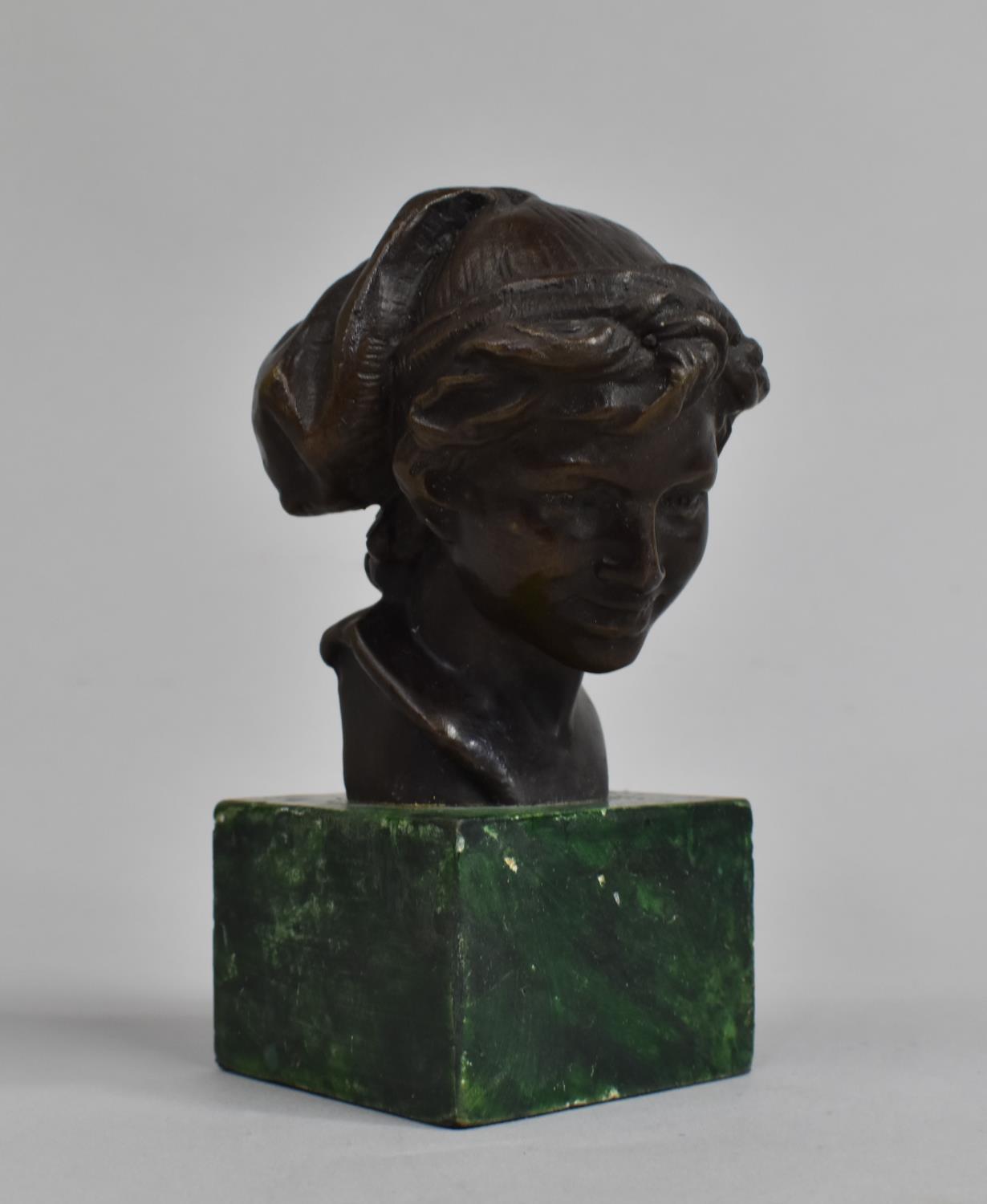 A Reproduction Bronze Bust of Peter Pan on Marble Plinth, 12cm high