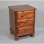 A Late 20th Century Stained Pine Three Drawer Bedside Chest, One Handle AF, 47cm wide