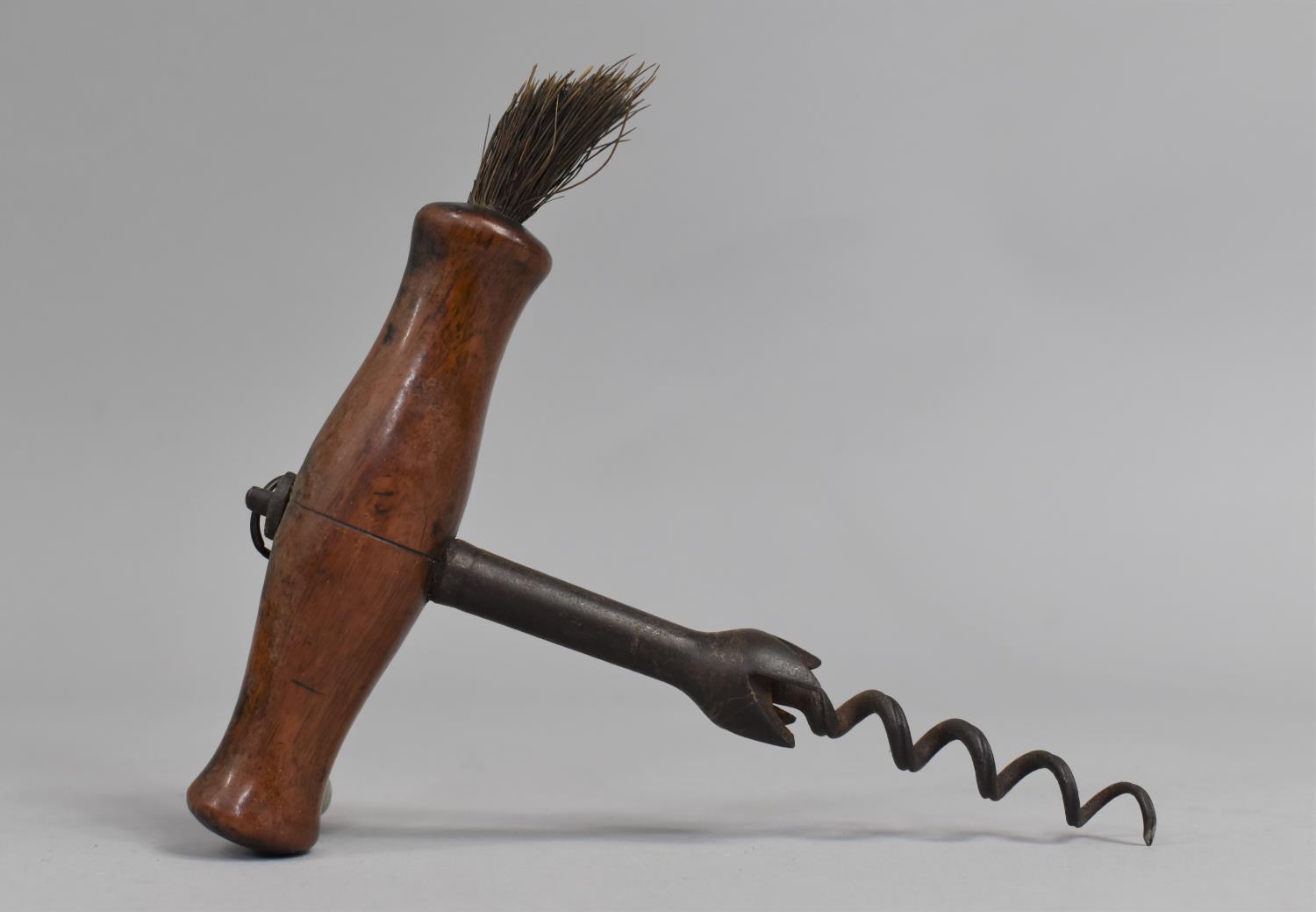 A 19th Century Corkscrew with Gripping Easer and Horse Hair Duster, 14cms High