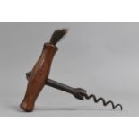 A 19th Century Corkscrew with Gripping Easer and Horse Hair Duster, 14cms High