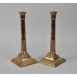 A Pair of Early 19th Century Bronze Candlesticks, 25cms high