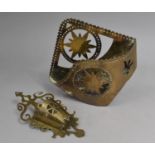 A Brass Gothic Revival Pierced Spill Holder together with a Brass Wall Mount with Starburst