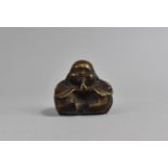 A Small Bronze Study of a Seated Buddha, 5cm Wide