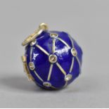 A Small Russian Style Blue Enamel and Silver Mounted Globular Pendant