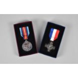 Two Silver Medals for National Service and General Service