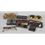 A Collection of Various Vintage Spectacles and Cases