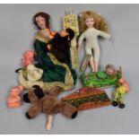 A Collection of Various Vintage Dolls and Toys
