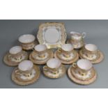 A Tuscan Pink and Gilt Decorated Tea Set with Polychromed Flower Floral Design to Comprise Severn