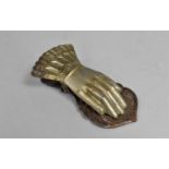 A Late Victorian/Edwardian Pressed Metal Letter Clip in the Form of a Hand, 9.5cms Long