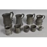 A Collection of Various Pewter Measures and Tankards