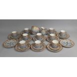 A 19th Century Porcelain Tea Service Decorated with Blue to Purple Ombre Floral Bowls on Gilt Ground