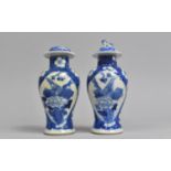 A Pair of 19th Century Chinese Prunus Pattern Lidded Baluster Vases with Bird on Rock Cartouches,
