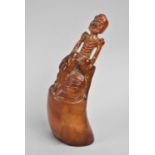 An Oriental Carved Horn Study of Seated Elder, 14.5cms High