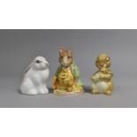 A Beswick Rabbit (AF), Beswick Beatrix Potter Samuel Whiskers (Gold Backstamp) and a Coalport Rabbit