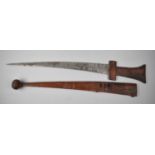 A North African Tuareg Takouba Short Sword with Slightly Curved Blade, Leather Handle, Leather