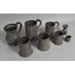 A Collection of Various Pewter Measures to comprise Double Spirit Example