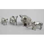 A Collection of Four Miniature Pig Ornaments, Largest 4.5cms