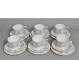 A Queen Anne Fern Decorated Tea Set with Blue Trim on White Ground to comprise Six Cups, Saucers and
