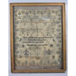 An Early 19th Century Framed Religious Sampler by Esther Jones, Dated 1821, 34x38cms, Condition