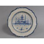An 18th/19th Century Delft Blue and White Plate with Pagoda Decoration and Wavy Rim, 25cm Diameter