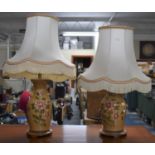 A Pair of Ceramic Table Lamps with Shades in the Form of Floral Decorated Oriental Vases, 41cm high