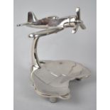 A Cast Aluminium Novelty Desk Top Souvenir Pin Tray in the Form of an Aeroplane Flying Over Map of