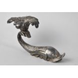 A Novelty Maltese Metal Candlestick in the Form of a Dolphin, 14cms Long