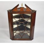 A 19th Century Mahogany Glazed Wall Hanging Corner Cabinet with Swan Neck Cornice and Brass Vase