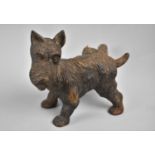 A Cast Iron Novelty Doorstop in the Form of Scotty Dog Cocking Leg, 20cms Wide