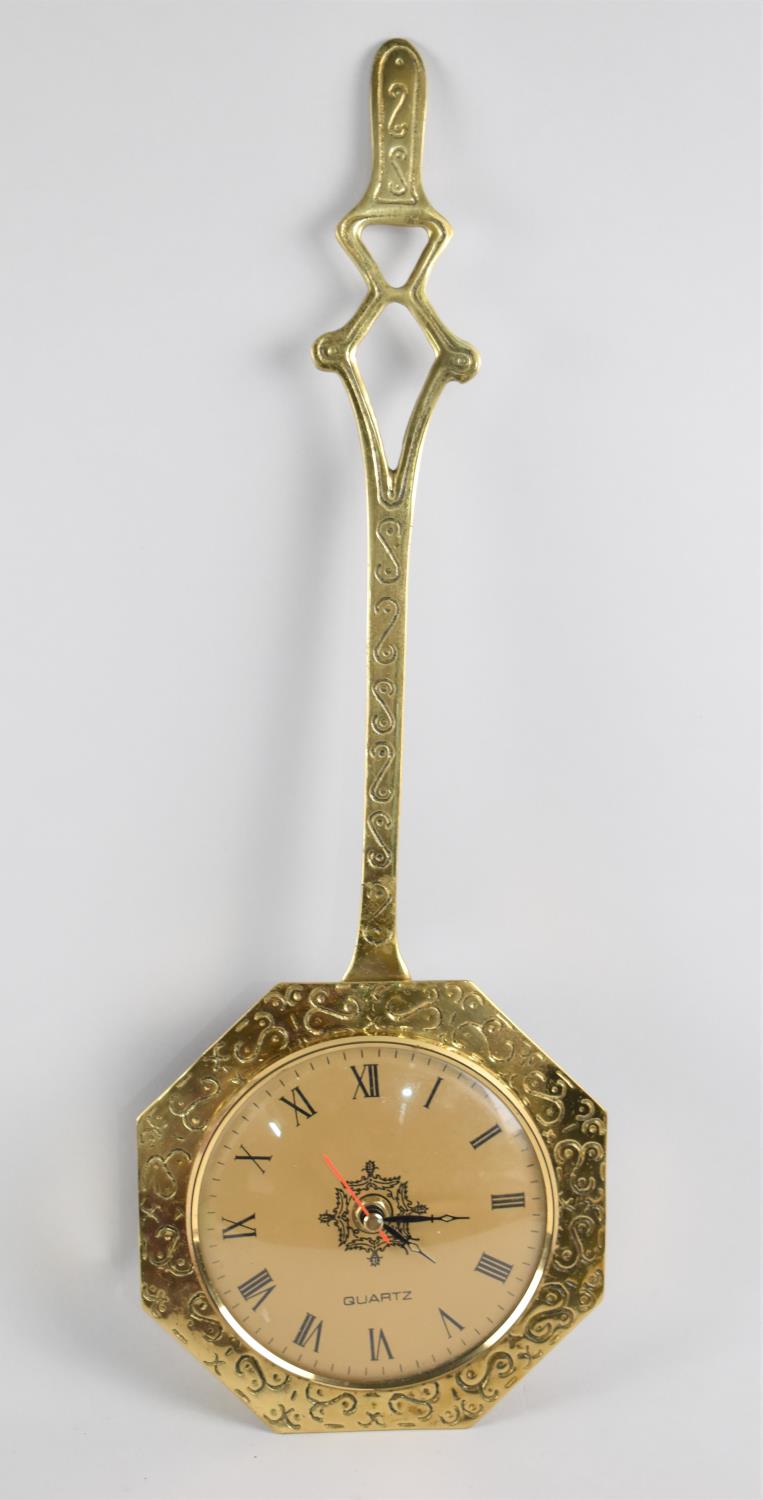 A Mid 20th Century Brass Wall Hanging Clock in the Form of an Octagonal Skimmer, 50cms High, Working