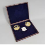 A Boxed Set of Two Concorde Gold Plated Medallions