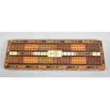 A Late Victorian/Edwardian Bone and Mixed Wood Inlaid Cribbage Board with Masonic Motif, Stamped