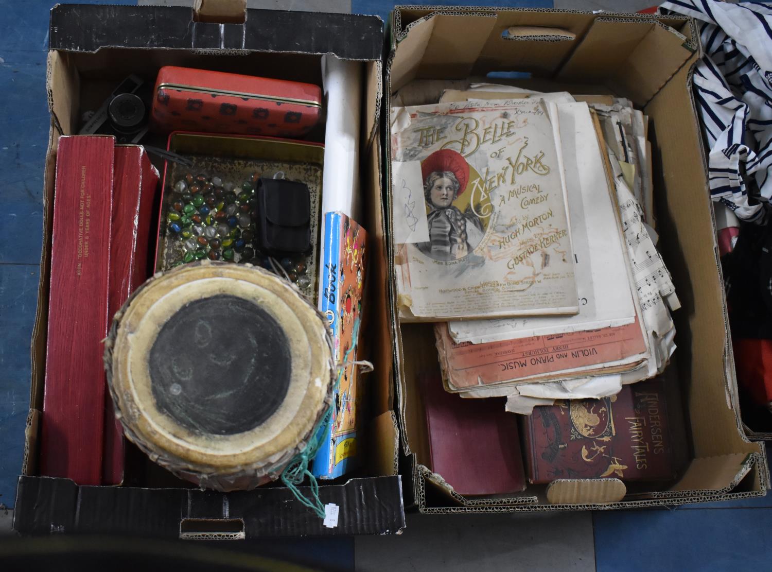 Two Boxes of Various Sundries to comprise Marble, Souvenir Drum, Doll, Sheet Music Etc