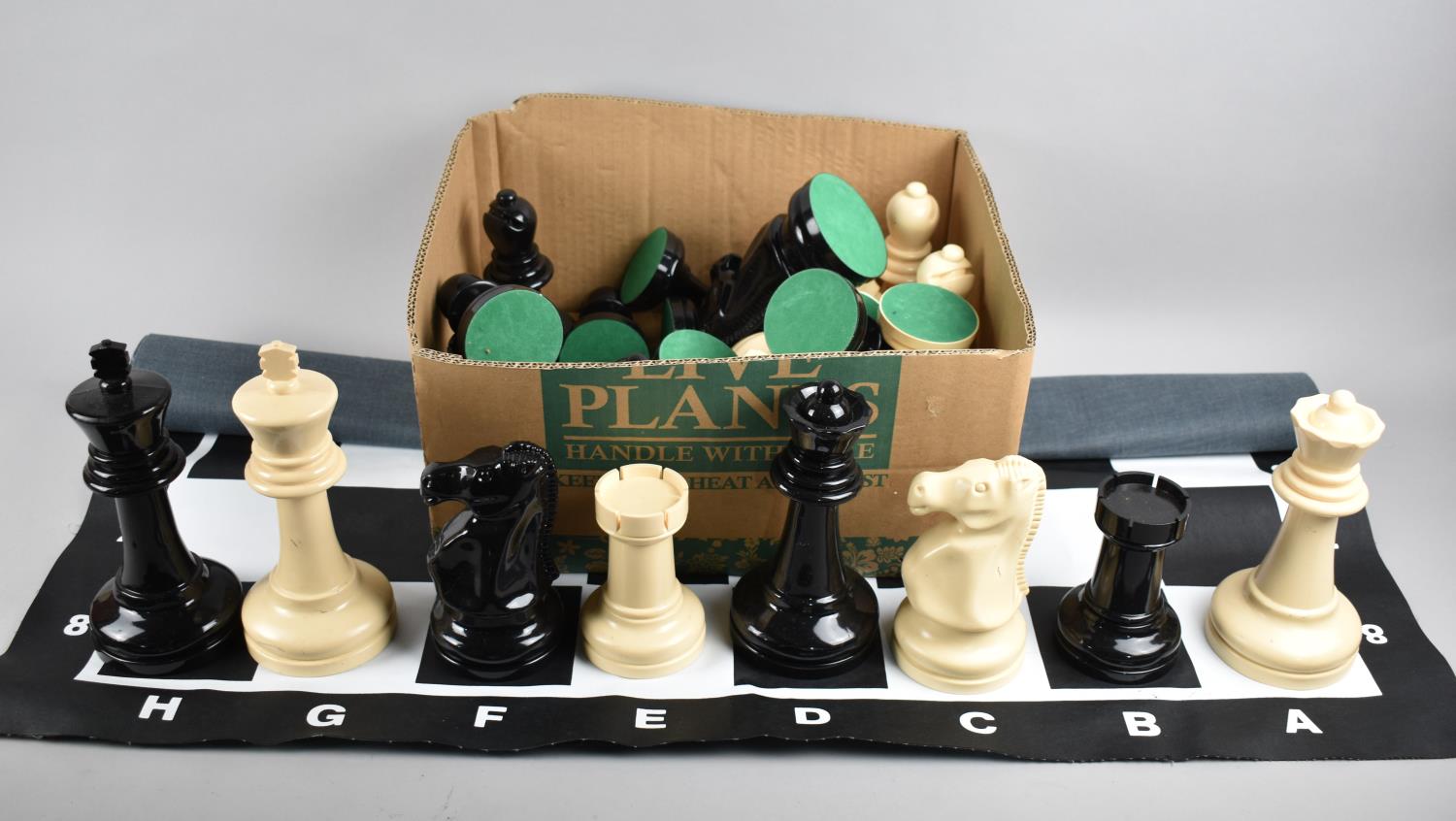 A Large Modern Garden Chess Set with Chess Board Mat, Kings 21cm high