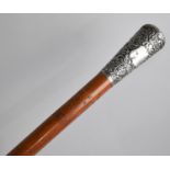 A Colonial Indian Silver Topper Malacca Walking Cane with Vacant Cartouche